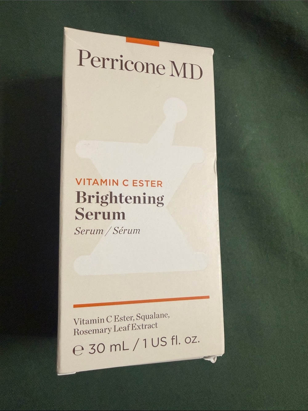 Perricone MD Brightening Serum - White and Orange Accents